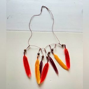 Handmade feather necklace with wooden beads and hemp string
